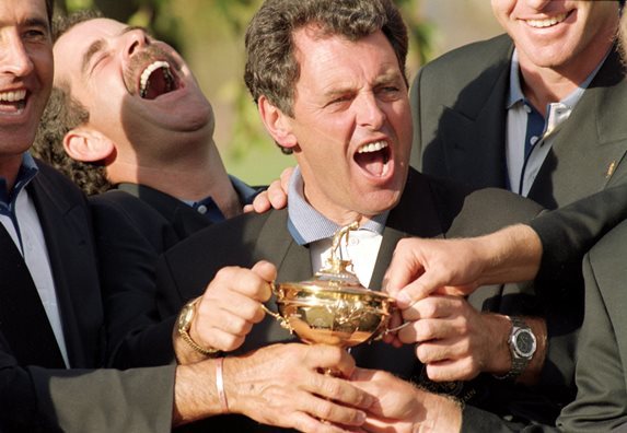 Bernard celebrates Team Europe's win in the 1995 Ryder Cup with team mate Sam Torrance